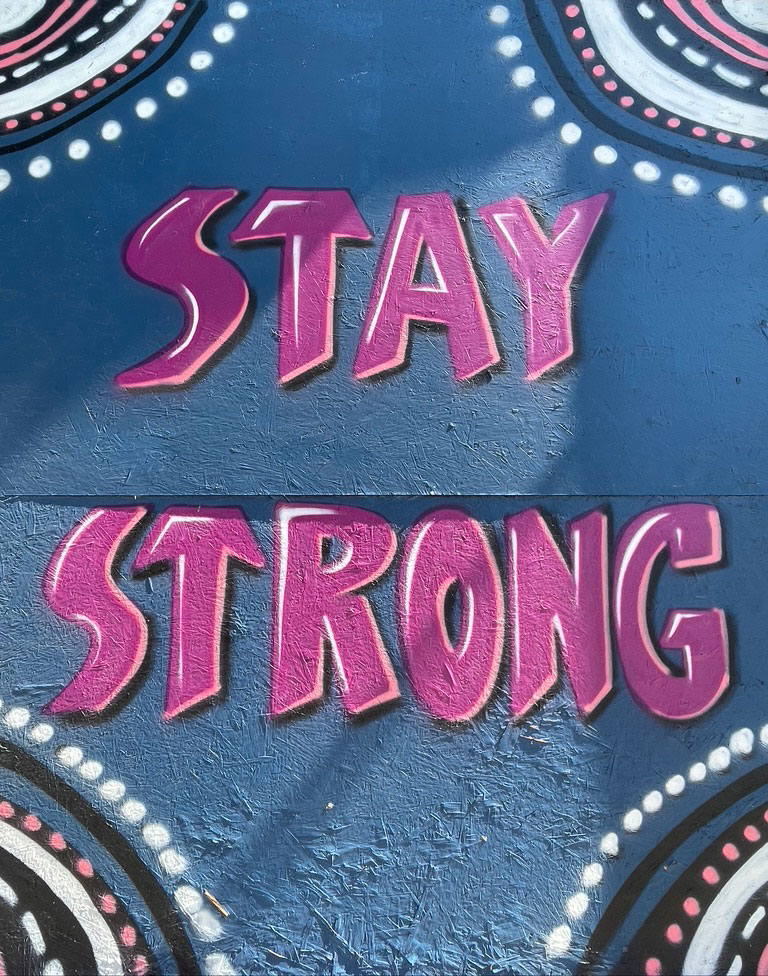 Stay Strong street Art Stay Strong in pink, on blue
