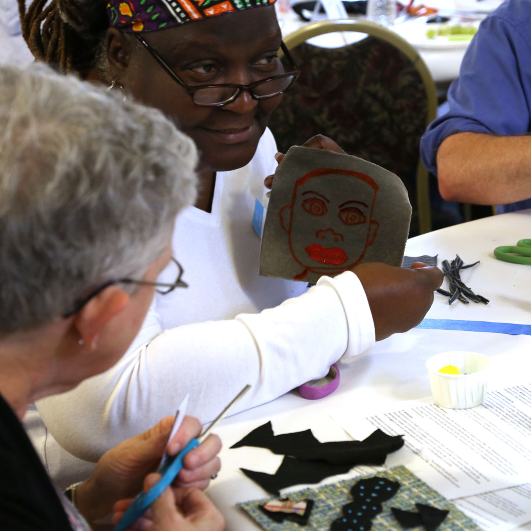 woman-shares-quilt-square African American woman shares quilt square