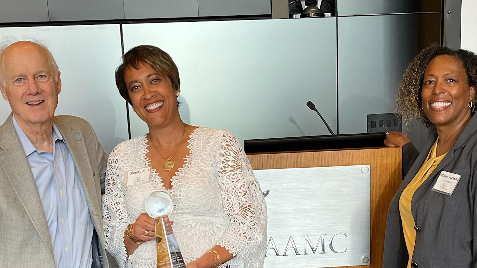 Dr. Wendy Ellis poses with colleagues while receiving Felitti Award